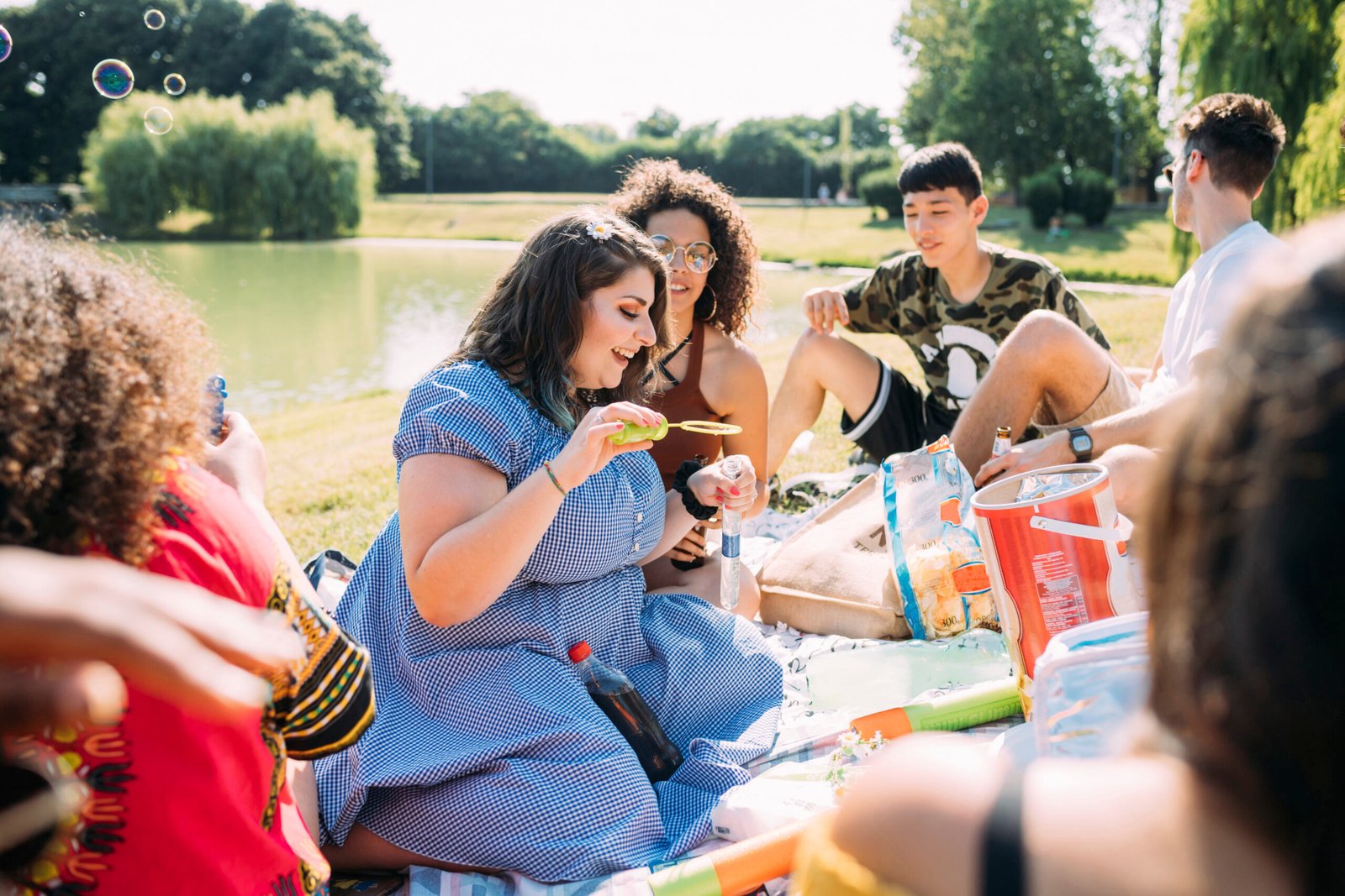 Friends having a picnic in the park 
